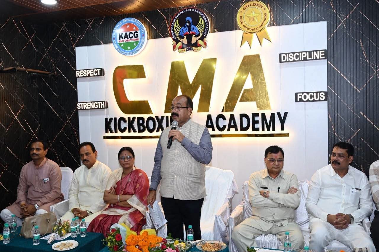 Chief guest addressing an event at CMA Kickboxing Academy